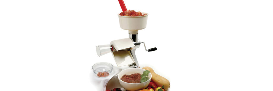 The Sauce Master II food processor being used to make tomato sauce.
