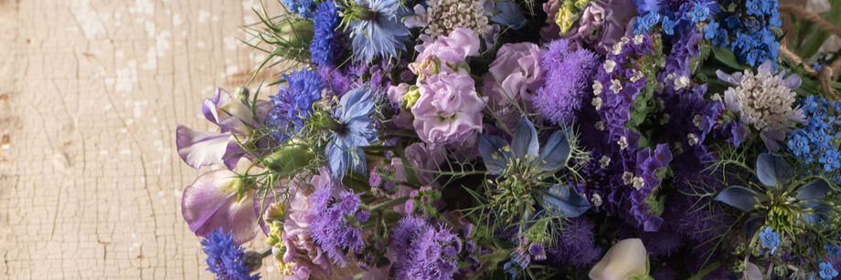 Bouquet of blue and lavender flowers.