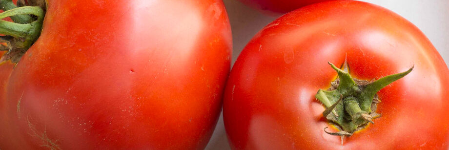 Two big, red beefsteak tomatoes.