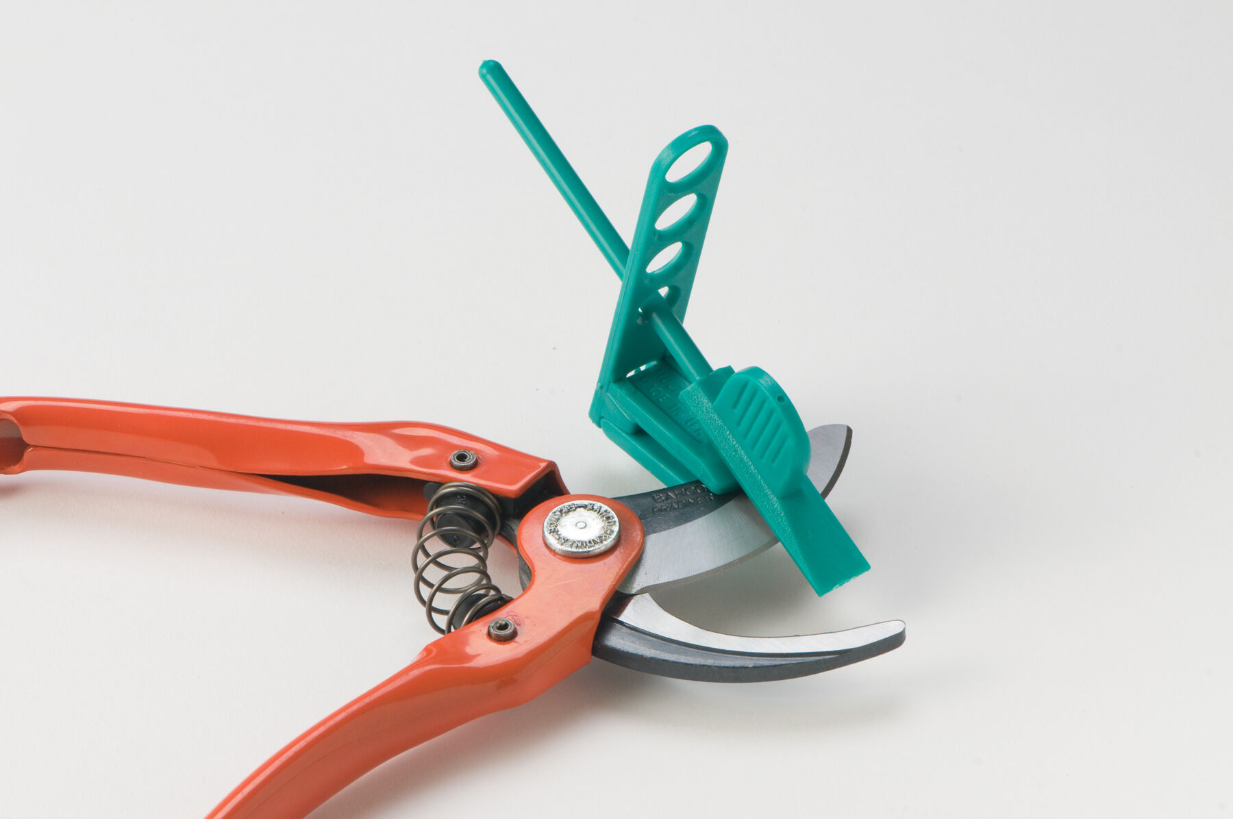 Pruner sharpener outlet