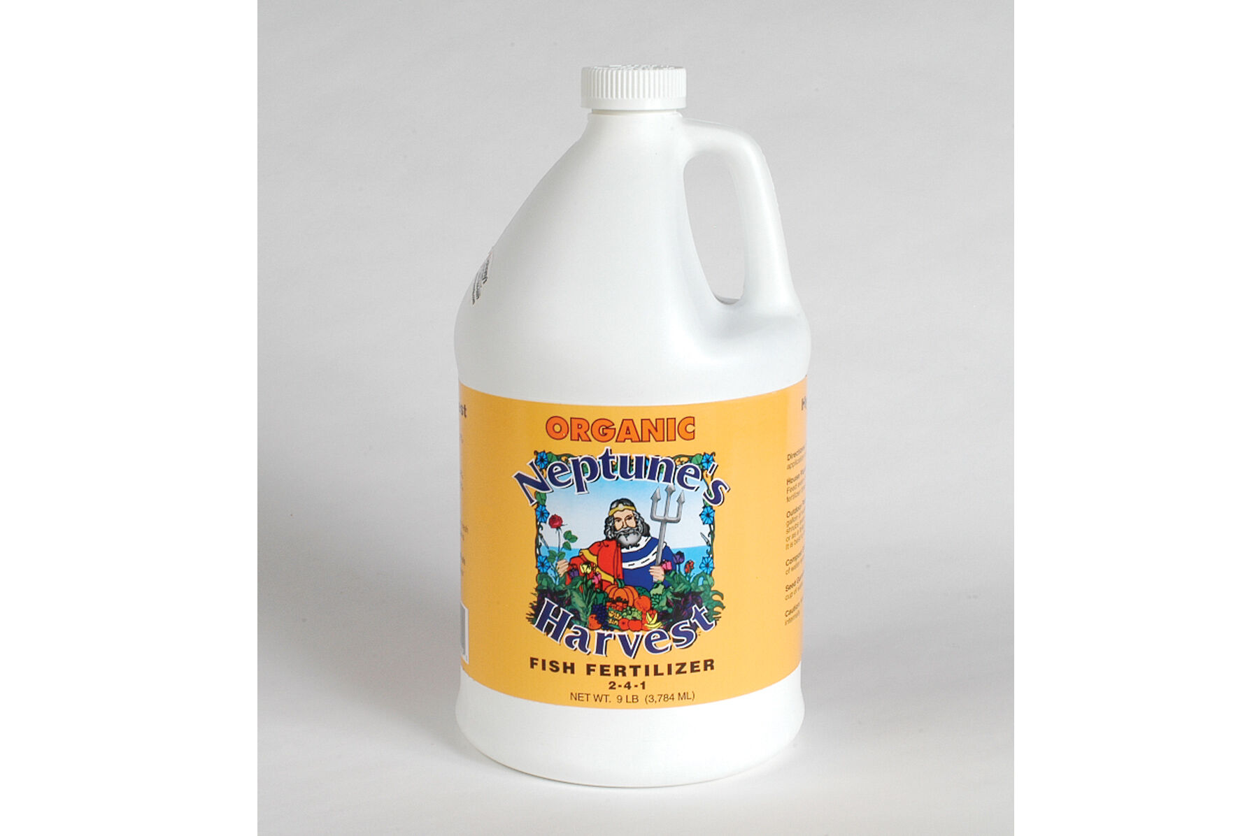 Image of Gardener using Neptune fertilizer injector