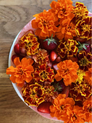 marigold flowers decorating a cake