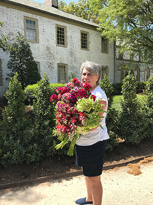 Lisa with an armful of dianthus and snaps