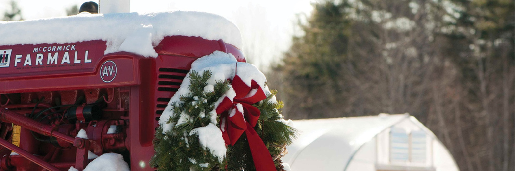 Farmal tractor with wreath on it