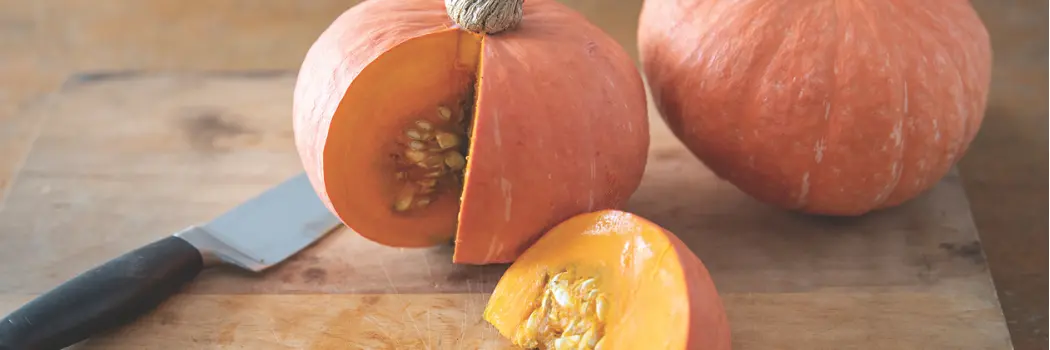 kabocha winter squash on cutting board
