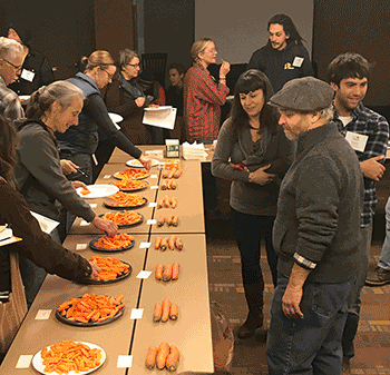 Dr. Navazio, Lane Selman, and Daniel Yoder run a blind carrot tasting at a recent New England Fruit & Veg Conference