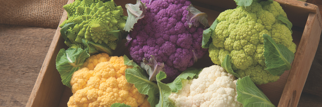 A box containing different types of cauliflower