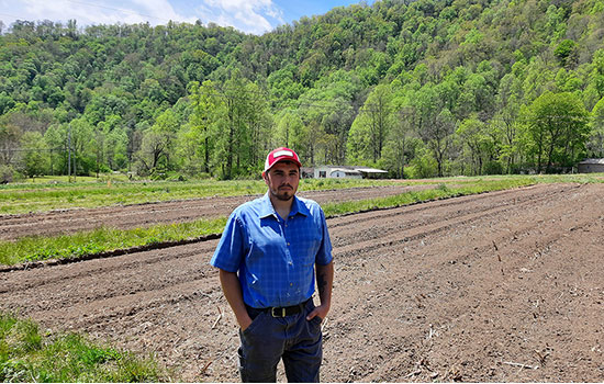 Thomas Bradley of Bradley Farms stands in the field at his North Carolina Farm