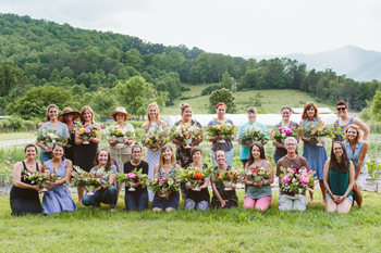 Participants in Evening on the Flower Farm, with their creations
